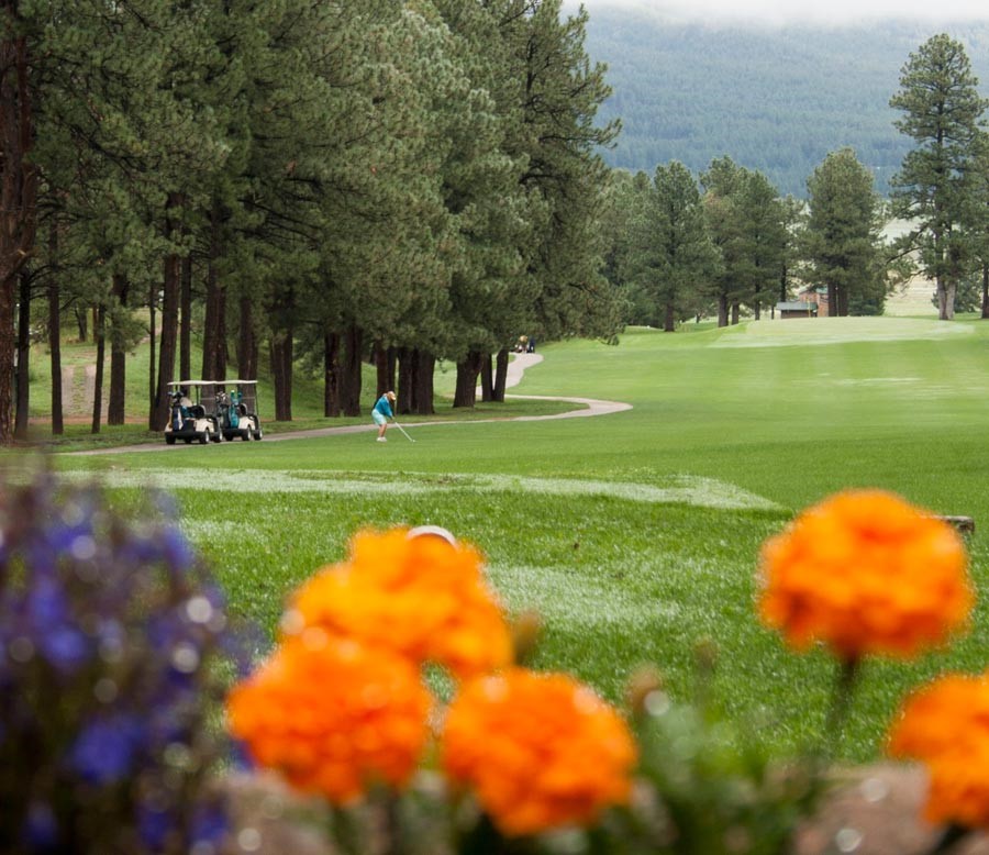 Golfer preparing to take a swing at the gorgeous golf community located at New Mexico Pendaries